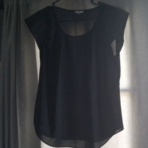 Black polka dot shirt